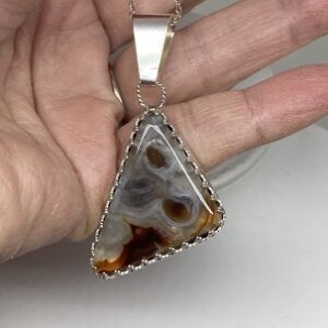 Fire Agate Pendant with White Quartz surrounding the red fire circles