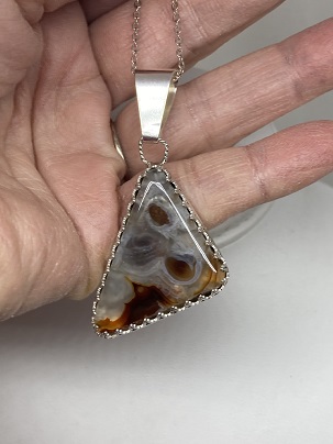 Fire Agate Pendant with White Quartz surrounding the red fire circles