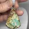 Green Turquoise Pendant With Brown and White Matrix