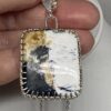 Unique White and Black Buffalo Turquoise Pendant