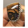 Blue Opal Ring From Australia Under Brown Stripes