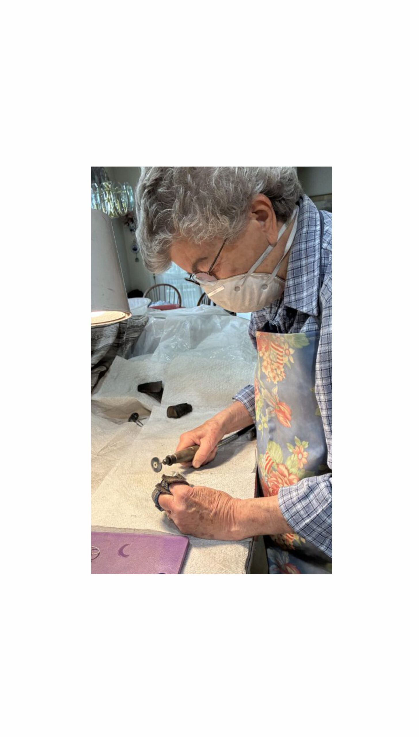 HAND POLISHING EACH SILVER ITEM